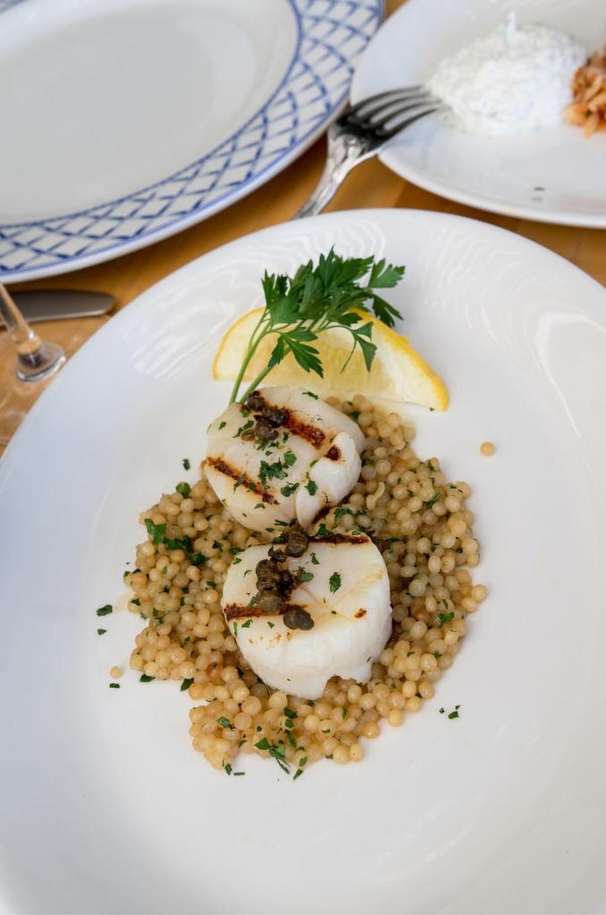Grilled scallops at Kiki on the River as a lunch entree are for the lighter eater, as there are only two, but they’re big and well seasoned.