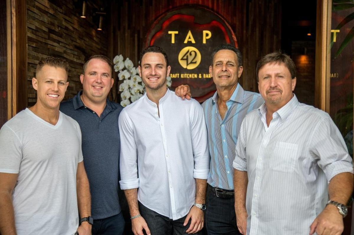 From left: Andrew Balick, culinary director; Andy Yeager, chief operating officer; Alex Rudolph, vice president of development; Douglas Rudolph, president; and Blaise McMackin, vice-president of design, are five of the six partner of Tapco, the restaurant chain behind Tap 42 Craft Kitchen and Bar.