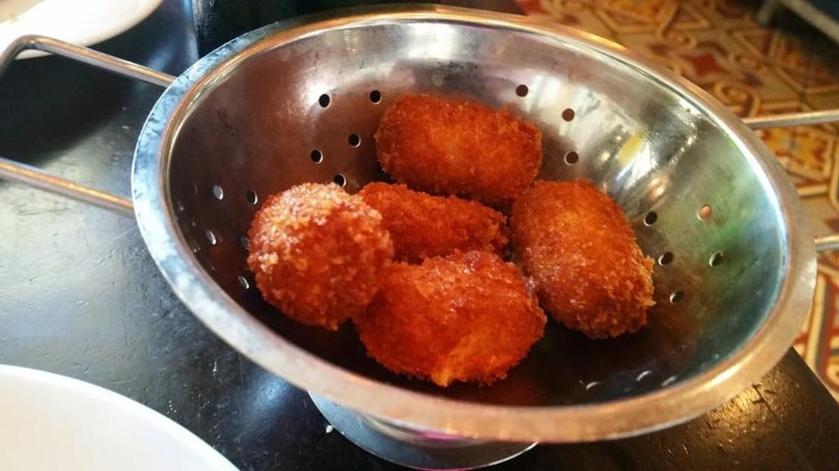 The Serrano ham croquetas are the top sellers at Love Is Blind and for good reason.
