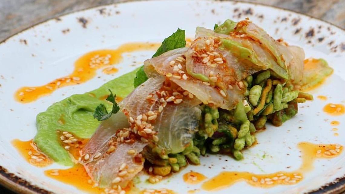Citrus-cured cobia bhel with Rancho Patel avocado and chili oil at Ghee Indian Kitchen.
