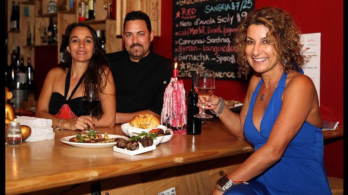 Owner Liza Meli (right) with her staff, waitress Andrea Schiavi and Chef Maykel Solis, will leave their 79th Street location to move into the space formerly belonging to Michelle Bernstein’s restaurant, CENA by Michy.