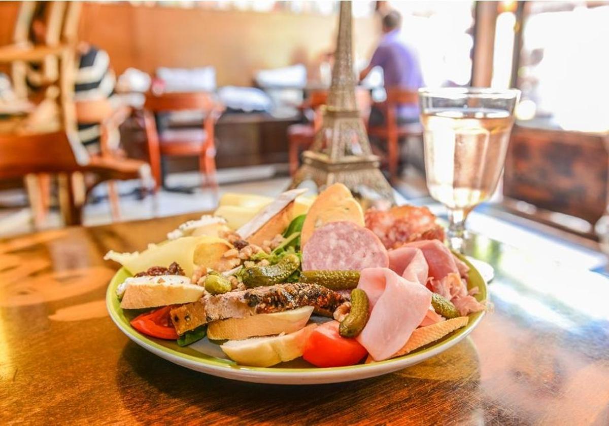 Great starter dishes at A La Folie are the cheese or charcuterie platters with smoked salmon and potato salad.