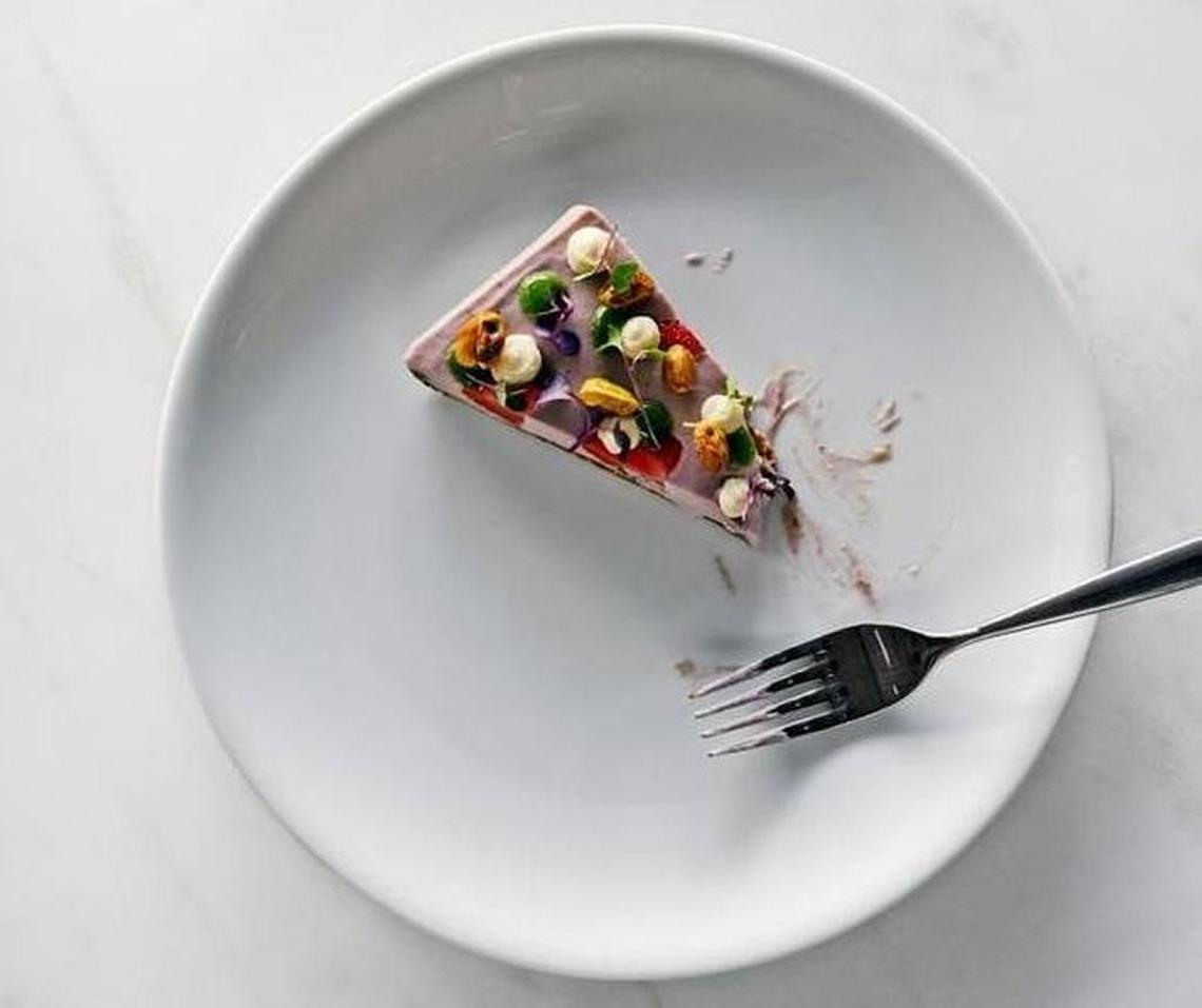 Kenney’s cooking skill is creating dishes such as this strawberry hibiscus “cheesecake” at Plant Food and Wine, which uses cashew cheese.