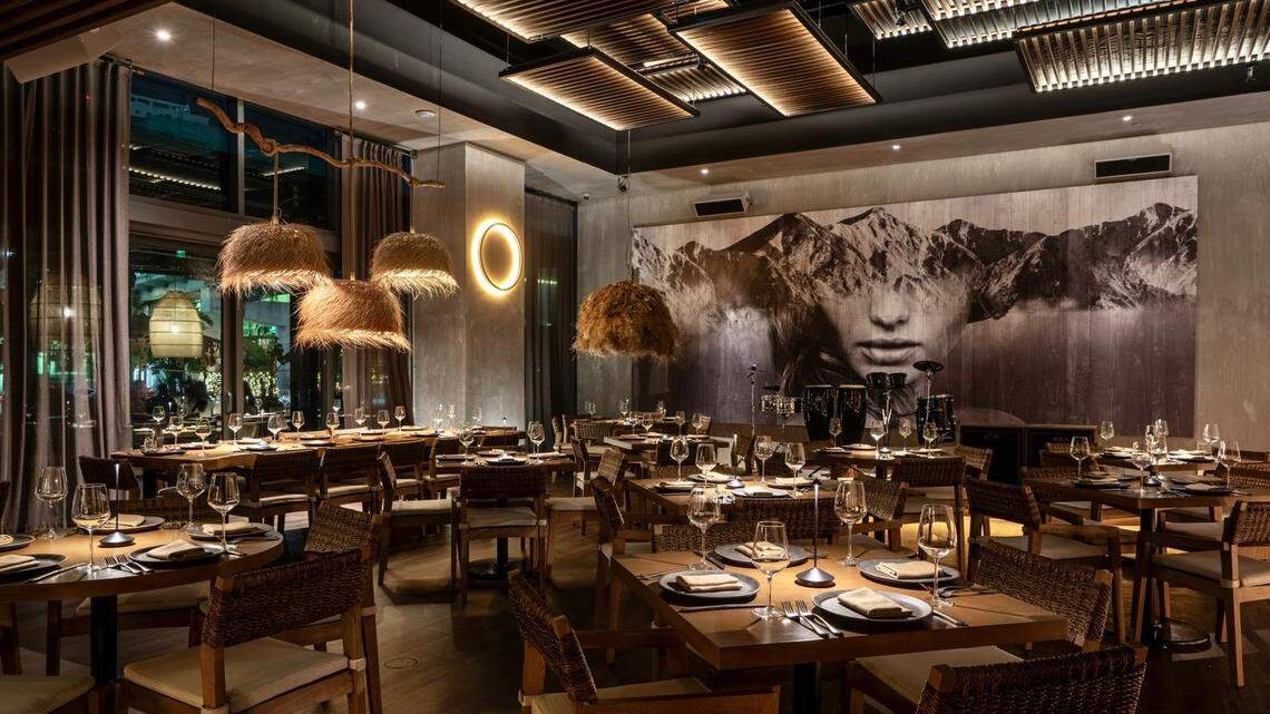 The dramatic dining room of the upscale RosaNegra restaurant from Mexico.