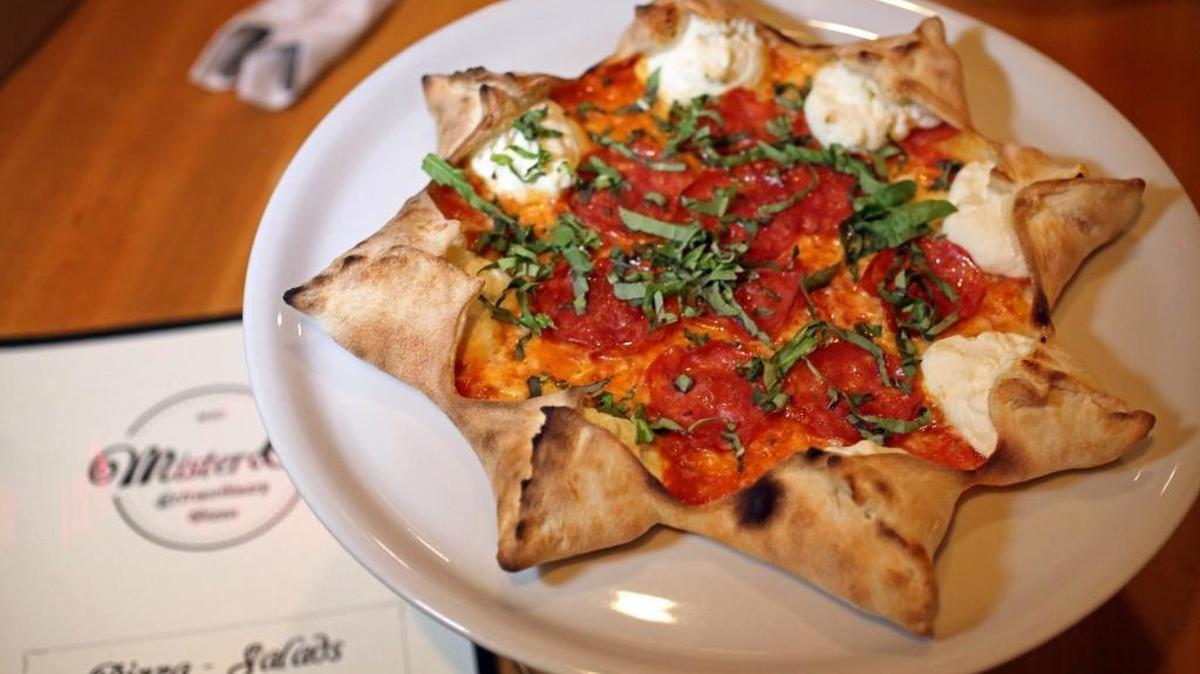 The famous Star Luca pizza at Mister O1 Extraordinary Pizza in Miami Beach, a great spot to eat for under $20.