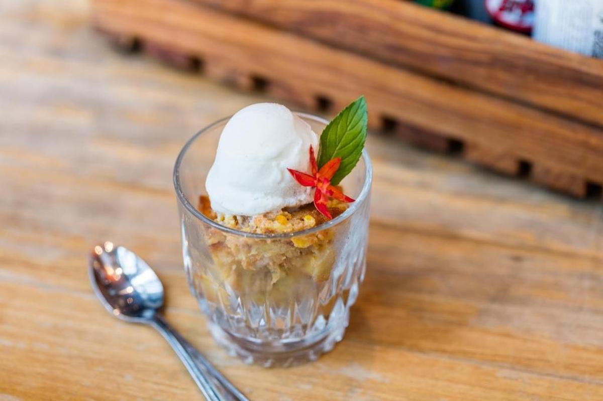 Corn pudding with goat milk caramel and vanilla ice cream at Tacology.
