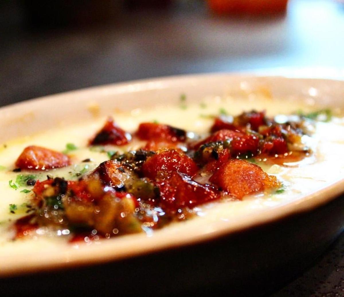 The spicy provoletta (a cheese aged 10 months), melted and mixed with petite diced chistorra sausages, is a crowd pleaser of a dish, served with crusty bread.