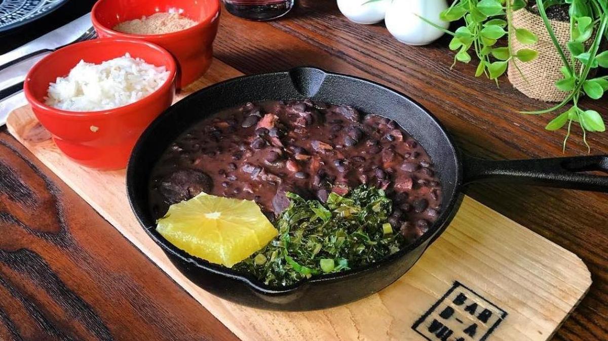 Feijoada black bean and pork stew is a weekly treat at the Brazilian Bar Da Vila