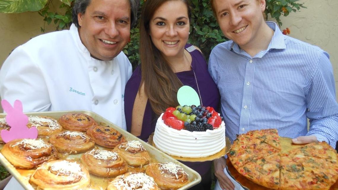 Owner Joaquin Bras with his partners Liliana Gago and her husband Jon Urizar with cinnamon buns, a fruit cake and Spanish tortilla at Moises Bakery La Chispa Venezolana, Hallandale Beach.