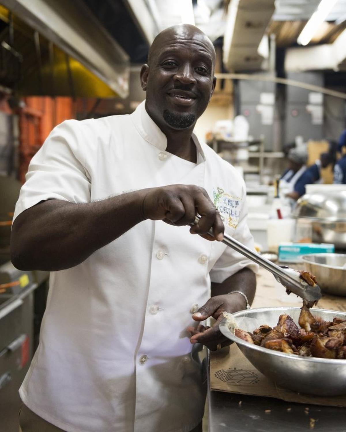 Wilkinson “Ken” Sejour in front of his restaurant on Northwest 54th Street in Miami on May 23, 2018. Today his popular Chef Creole restaurant is now in five locations, with a sixth opening at Miami International Airport soon. Chef Creole is a Haitian restaurant at its roots, but it was also crossover success and doing “fusion” fare before that was even part of the foodie lingo.