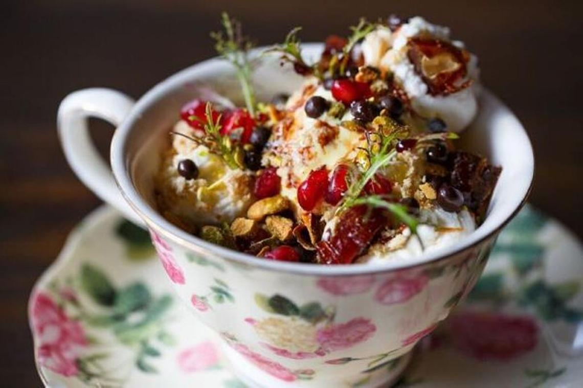 Sundae in a teacup with rosewater, saffron and pistachio gelato.