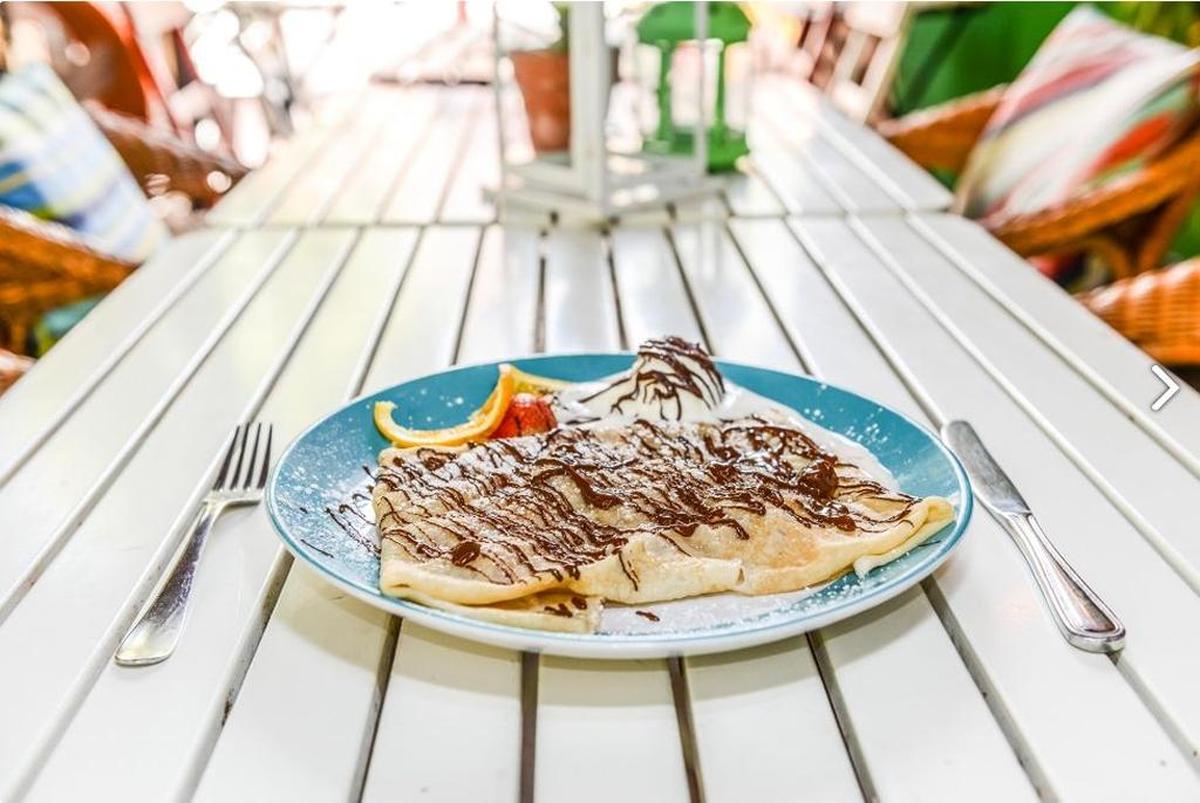 Sweet crepes at A La Folie include butter and sugar with ice cream or chocolate spread and bananas.