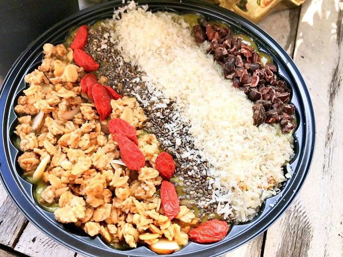 Acai bowl with house granola, coconut and cacao nibs at Yoko Matcha.