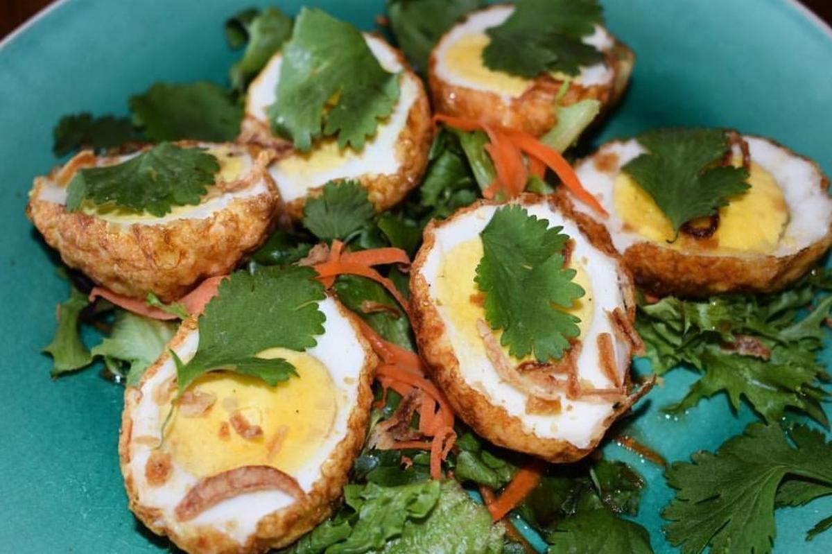 Son-in-Law Eggs, or khai luk khoei, a hearty portion of hardboiled eggs, have been quickly deep fried to a crisp outside and tender inside.