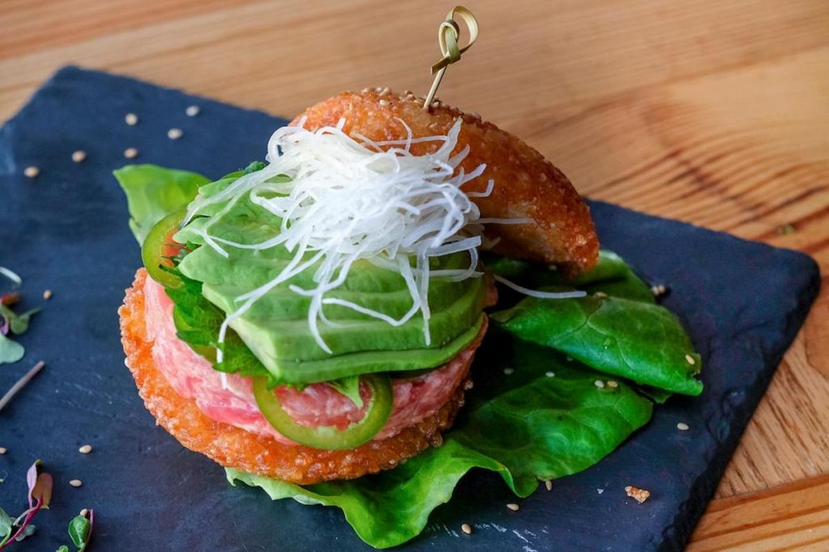 The Tanuki ‘burger’ composed of tuna tartare with avocado, shiso leaf, butter lettuce and daikon shreds.