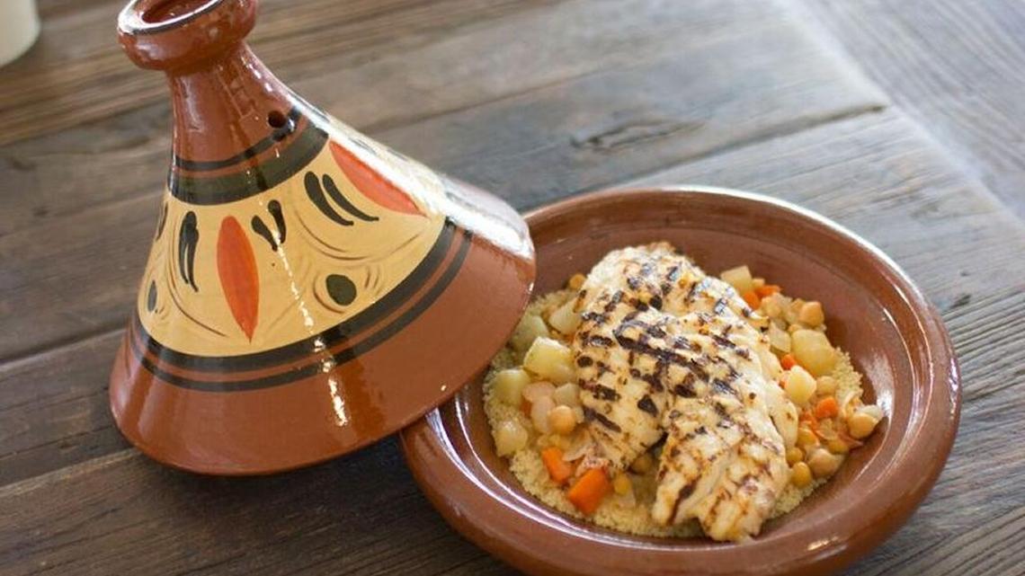 Snapper tajine with couscous and vegetable stew with harissa at Panarea Mediterranean Sea Grill.