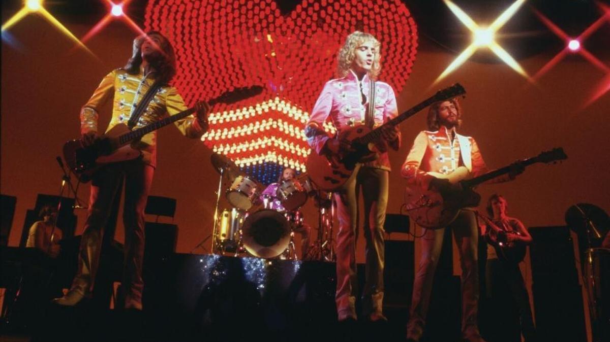 Robin Gibb, Maurice Gibb (on drums), Peter Frampton and Barry Gibb put a 1978 spin on Beatles tunes in “Sgt. Pepper’s Lonely Hearts Club Band.” The movie musical is coming to Blu-ray on Sept. 26, 2017.