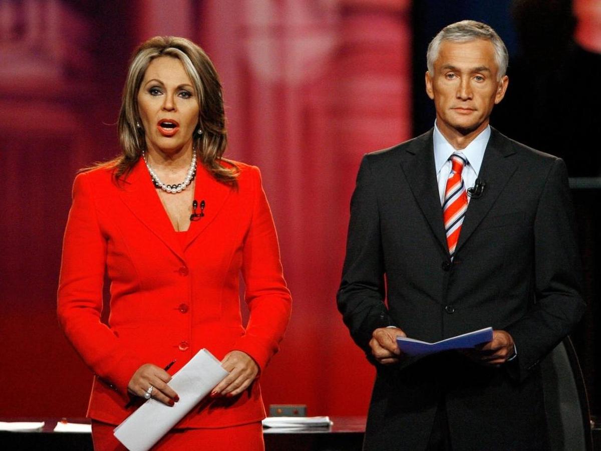 Univision anchors, Maria Elena Salinas, left, and Jorge Ramos, right, make opening statements during the Univision Republican Presidential Candidate Forum at the University of Miami in Coral Gables, Fla. Sunday, Dec. 9, 2007.
