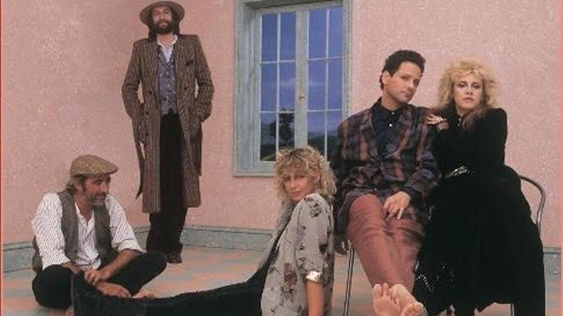 John McVie (seated), Mick Fleetwood (standing), Christine McVie (on floor), Lindsey Buckingham and Stevie Nicks (on seat) in a photo shoot from the “Tango in the Night” sessions. The original album was released in April 1987 and was a worldwide hit, especially in England where it hit No. 1. In the United States the album spent 44 weeks in the Top 40.