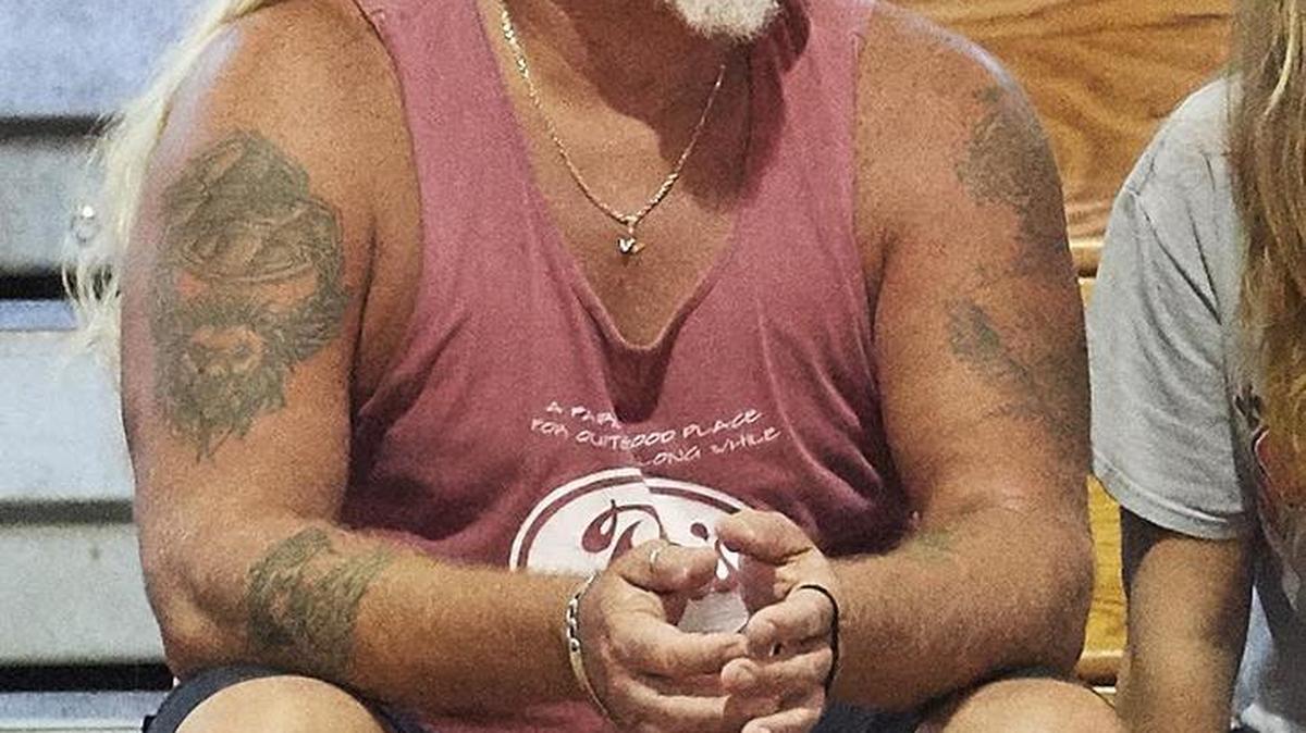‘Survivor’ cast member Paul Wachter watches his daughter play volleyball Tuesday for Key West High against Keys Gate at the Conchs’ gym.