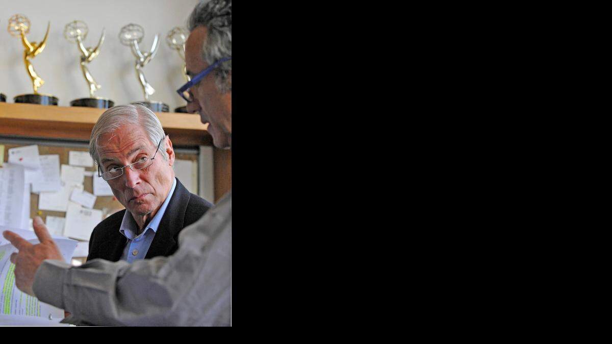 
In this March 24, 2010 photo released by CBS, "60 Minutes" correspondent Bob Simon speaks with a news producer at the CBS Broadcast Center in New York. CBS says Simon was killed in a car crash on Wednesday, Feb. 11, 2015, in Manhattan. 
