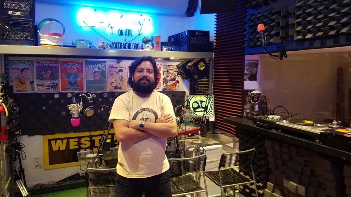 Jolt Radio founder John Caignet in his station’s new Allapattah location, a former Western Union building that has since been transformed into an art studio, record store, coffee shop and radio station.