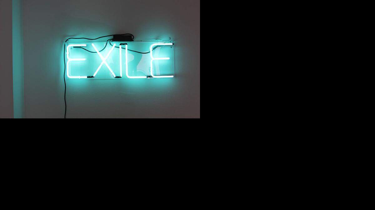 
The neon sign for the EXILE Books pop-up shop.


