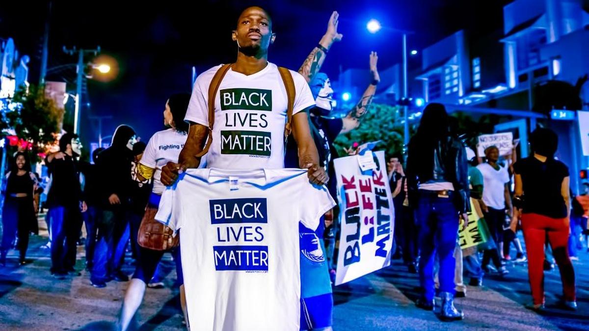 
Photographer Cendino Temé’s photos from the Black Lives Matter protest during Art Basel are on display in Overtown.
