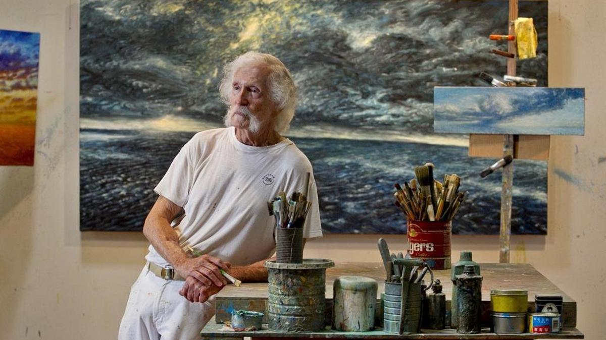 
Jim Couper, a retired FIU art professor, works on his passion, Everglades landscapes, in his home studio.
