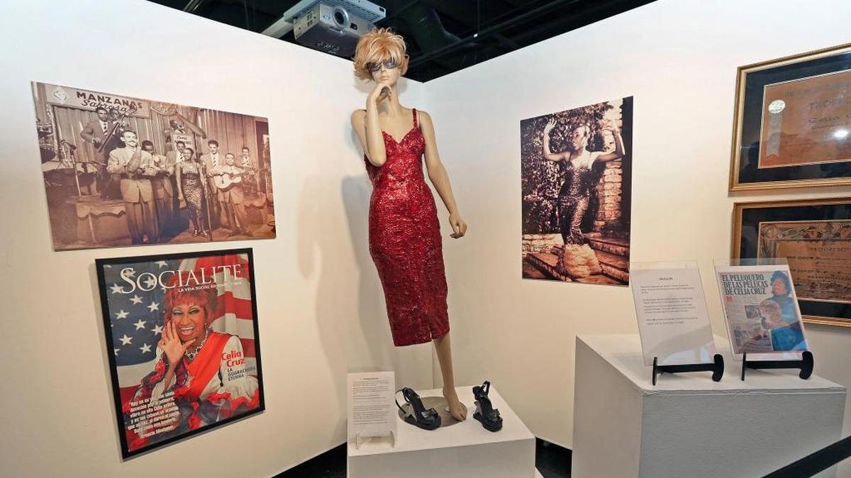 A dress and wig belonging to Celia Cruz that she wore in the 1950s, along with documents, as part of the Orestes Chavez Cuban Historical Collection on exhibit at Miami Dade College North Campus on Wednesday October 22, 2015