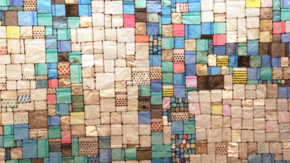 An artistic compilation of used drug bags on display in Miami Beach. Tom Fruin ‘A.E. Smith-Shattered’ (2009)