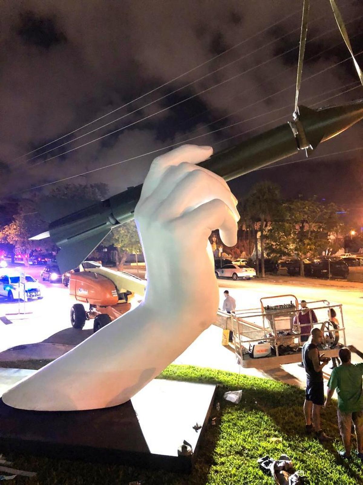Lorenzo Quinn’s “A Dangerous Game” outside Mana Wynwood.