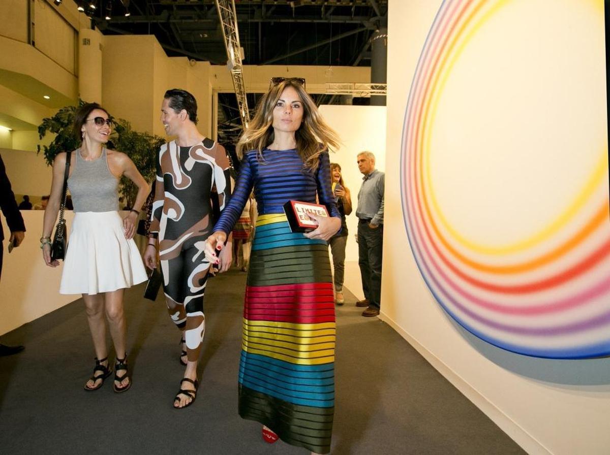 Carolina Parsons, Di Mondo and Erica Pelosini, left to right, during Art Basel at the Miami Beach Convention Center in 2015.