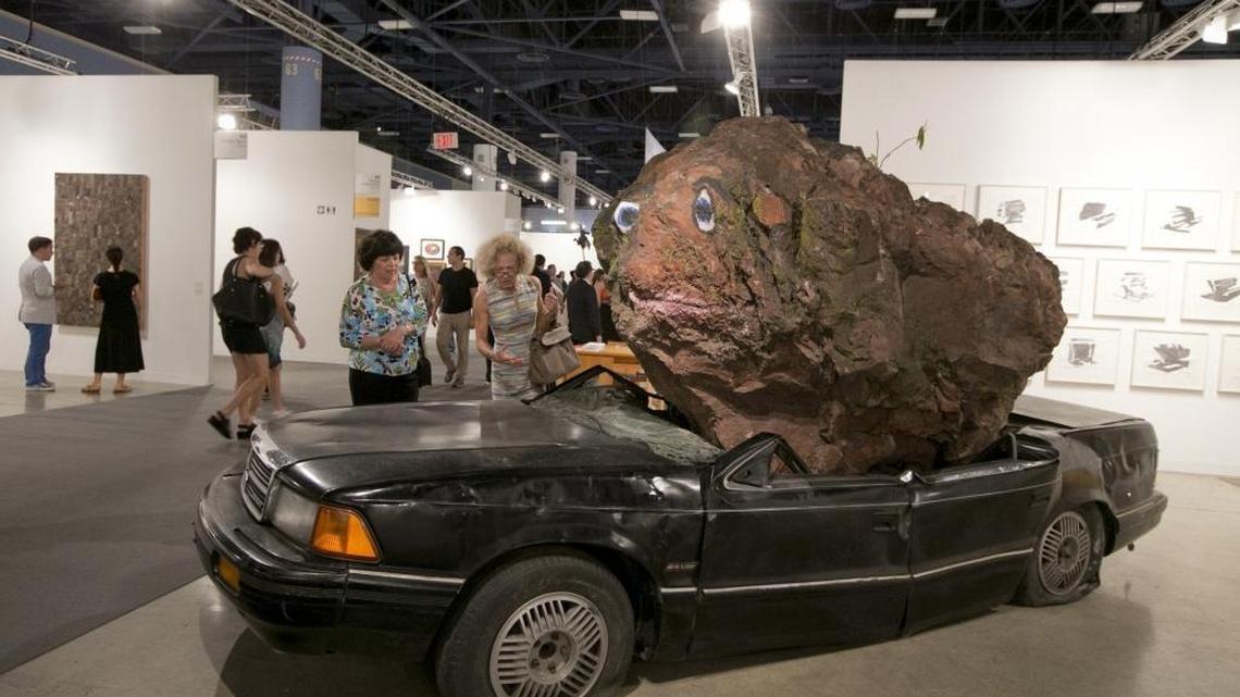 A popular exhibit (Still Life with Xitle and Spirit by artist Jimmie Durham) is shown on exhibit during Art Basel 2015 at the Miami Beach Convention Center. Zika, a post-election hangover and a slowdown in Latin America could dampen the mood at this year’s Basel, which starts Dec. 1.