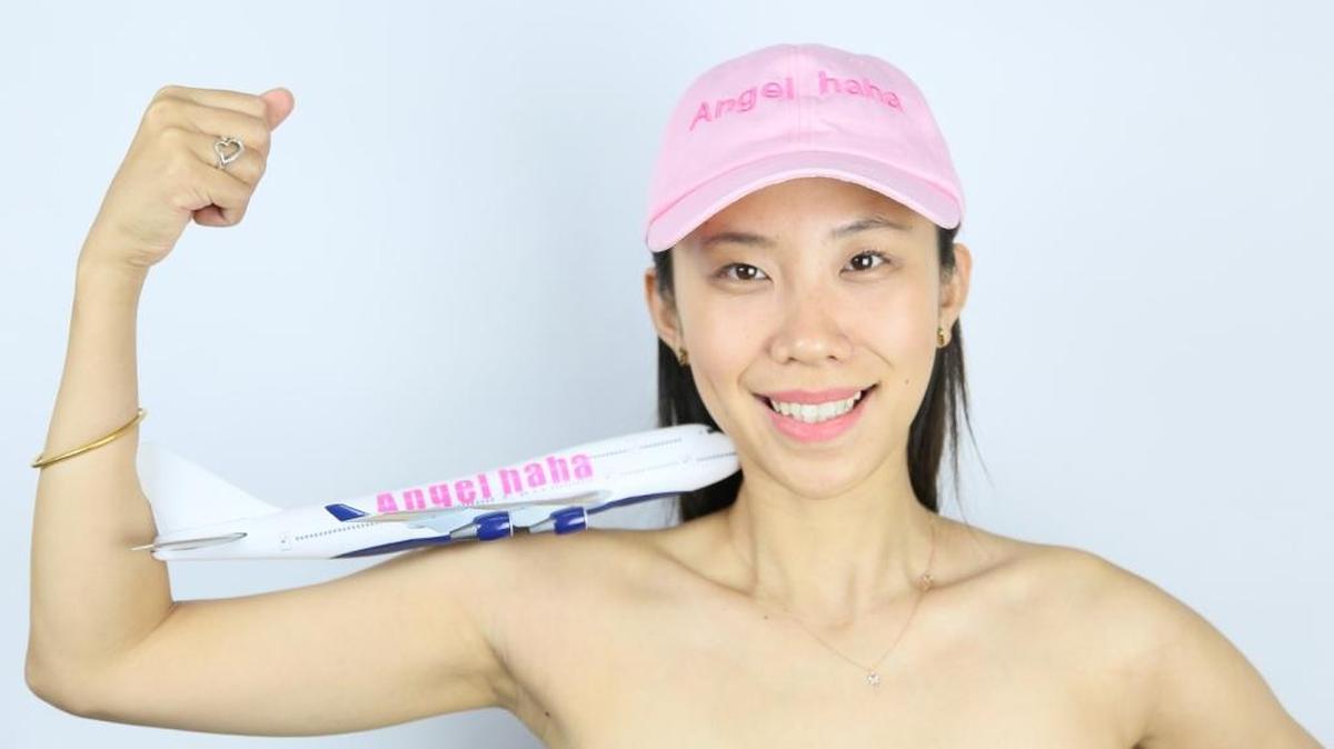 Qinmin Liu, the artist behind Angelhaha Airline, which boasts it’s the only airline to cater to artists.