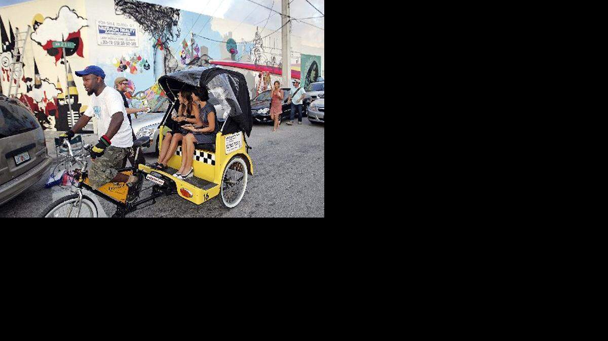 
Rickshaw drivers weave in and out of Wynwood traffic during Miami’s Art Week.
