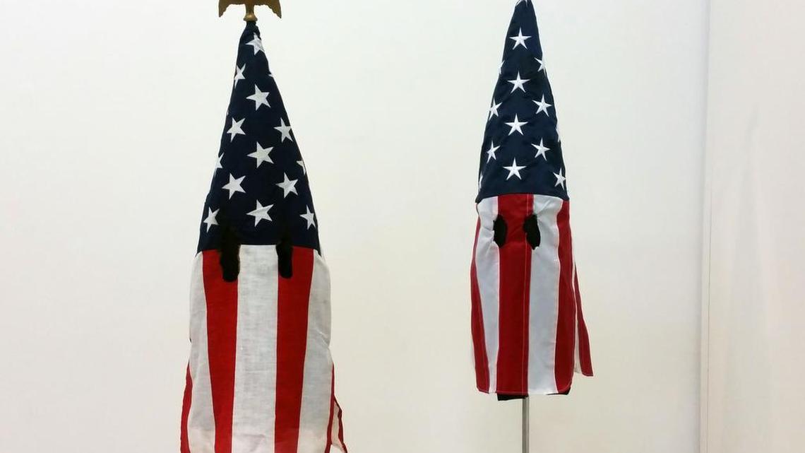 Artist Billie Grace Lynn’s American Mask exhibit turns American flags into Ku Klux Klan hoods, inspired by the deadly protests in Charlottesville in August. Lynn’s pieces will be a part of the University of Miami’s 2017 Faculty Exhibition Oct. 23-Nov. 12 at University of Miami Gallery inside the Wynwood Building.