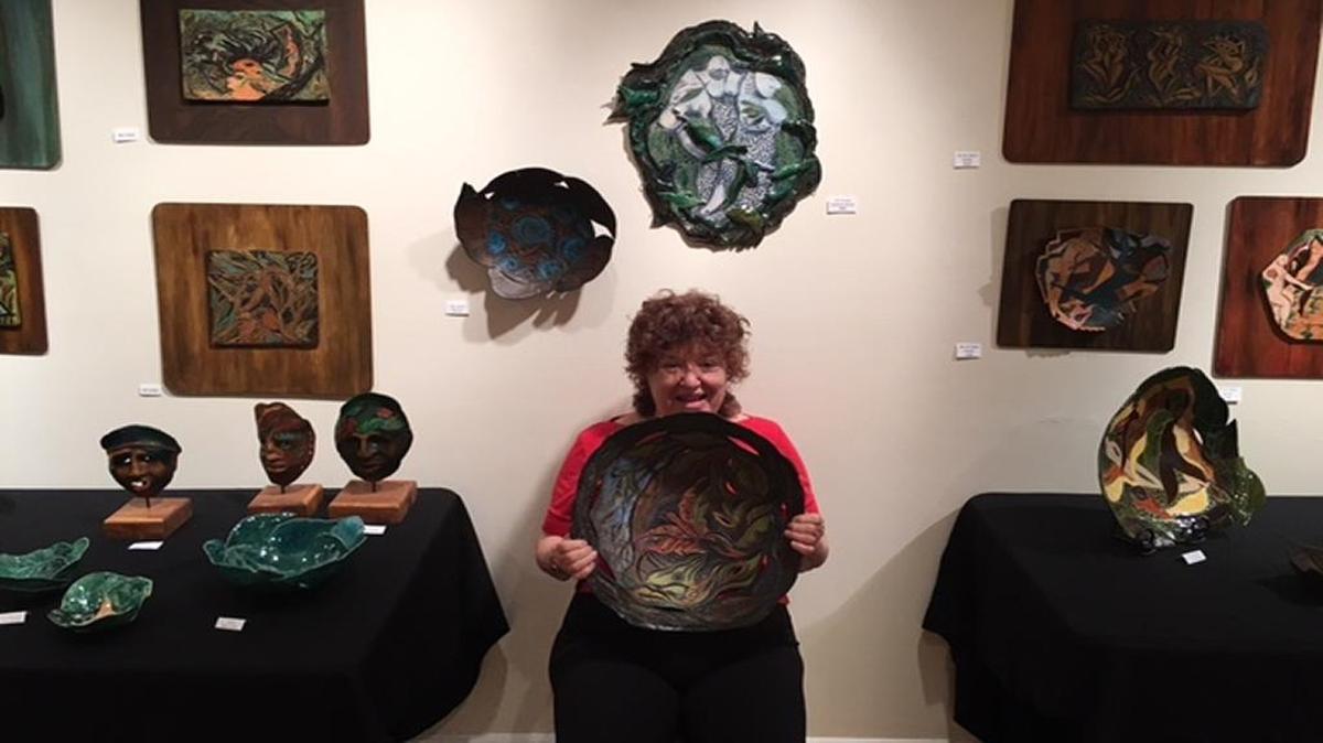 Sandra Sher Goldman with many of her artworks at the Futernick Family Gallery.