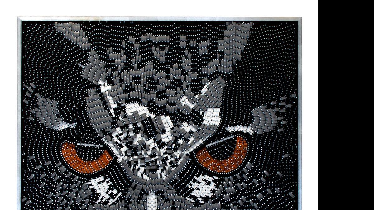 
Pepe ‘Jose’ Calderin’s 2014 ‘Owl,’ made with coax staples on wood, is being shown at the Cornell Museum of Art and American Culture in Delray Beach.
