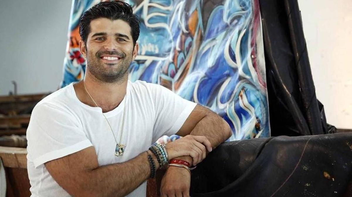 Miami-born artist Alexander Mijares with his art installation, ‘Freedom, during its unveiling at Art Basel in December.