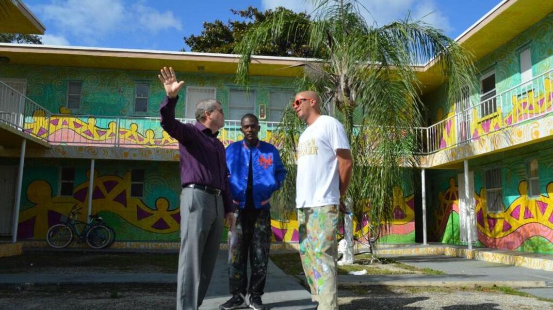 Neighborhood artists paint colorful murals to bring a bit of Wynwood to Overtown