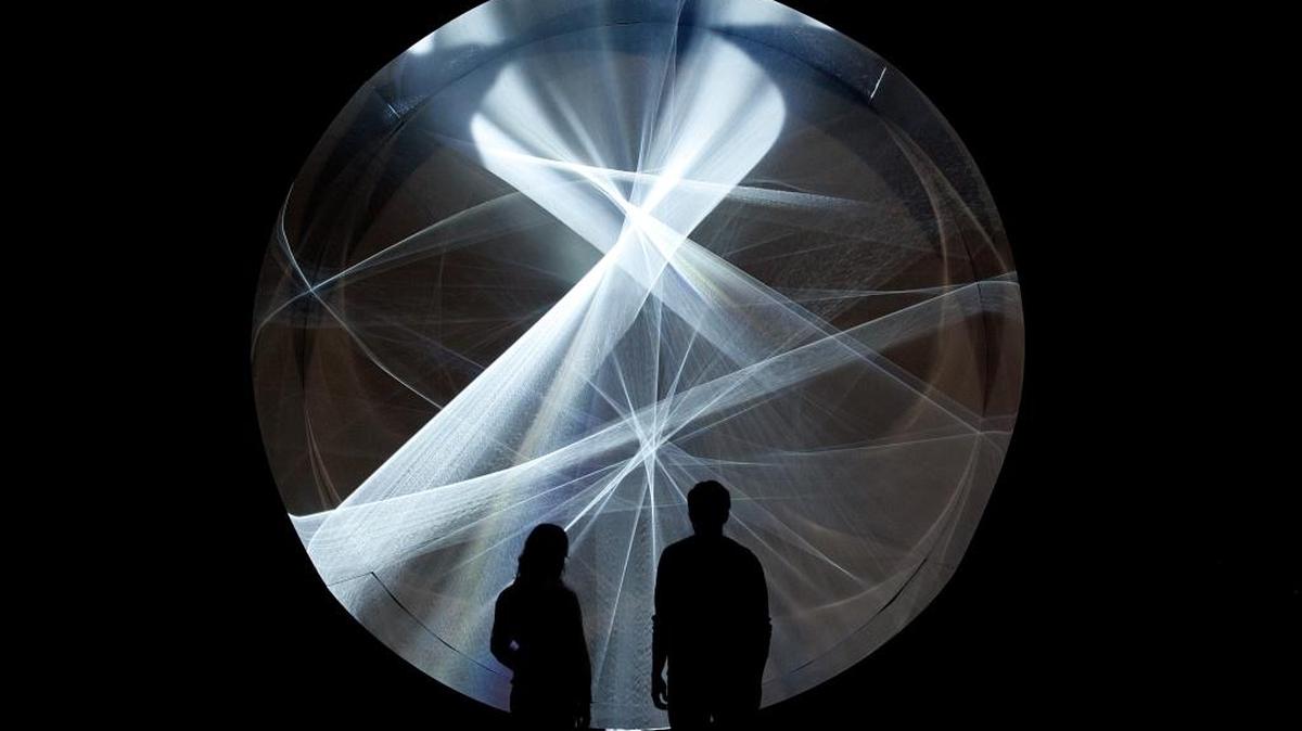 Julio Le Parc’s “Continuel- lumière cylindre (Continuous Light Cylinder)” 1962/2013. Painted wood, stainless steel, motor, metal disk, and light. From the show “Julio Le Parc: Form into Action” at Perez Art Museum Miami through March 19.
