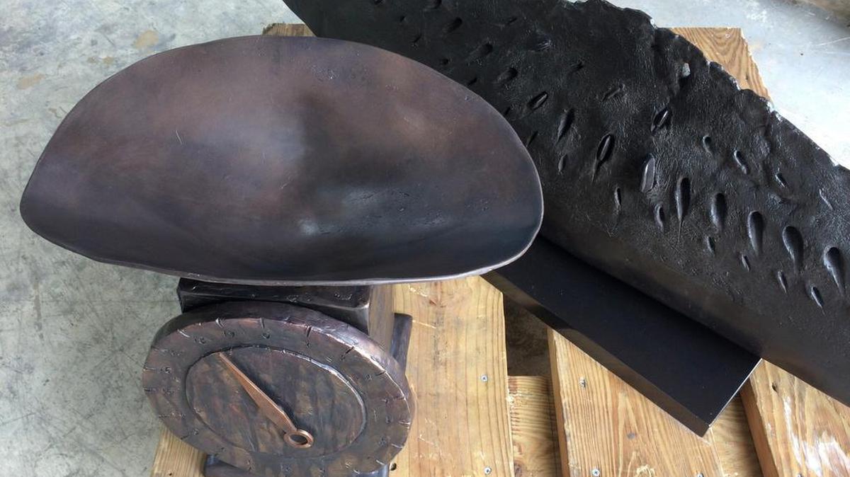 Julio Larraz, Weighing Dark Matter, (ASU Foundry), 2016, bronze, 18 x 16 x 10 inches and The Nautilus, 1998, bronze 16 x 82 x 14 inches