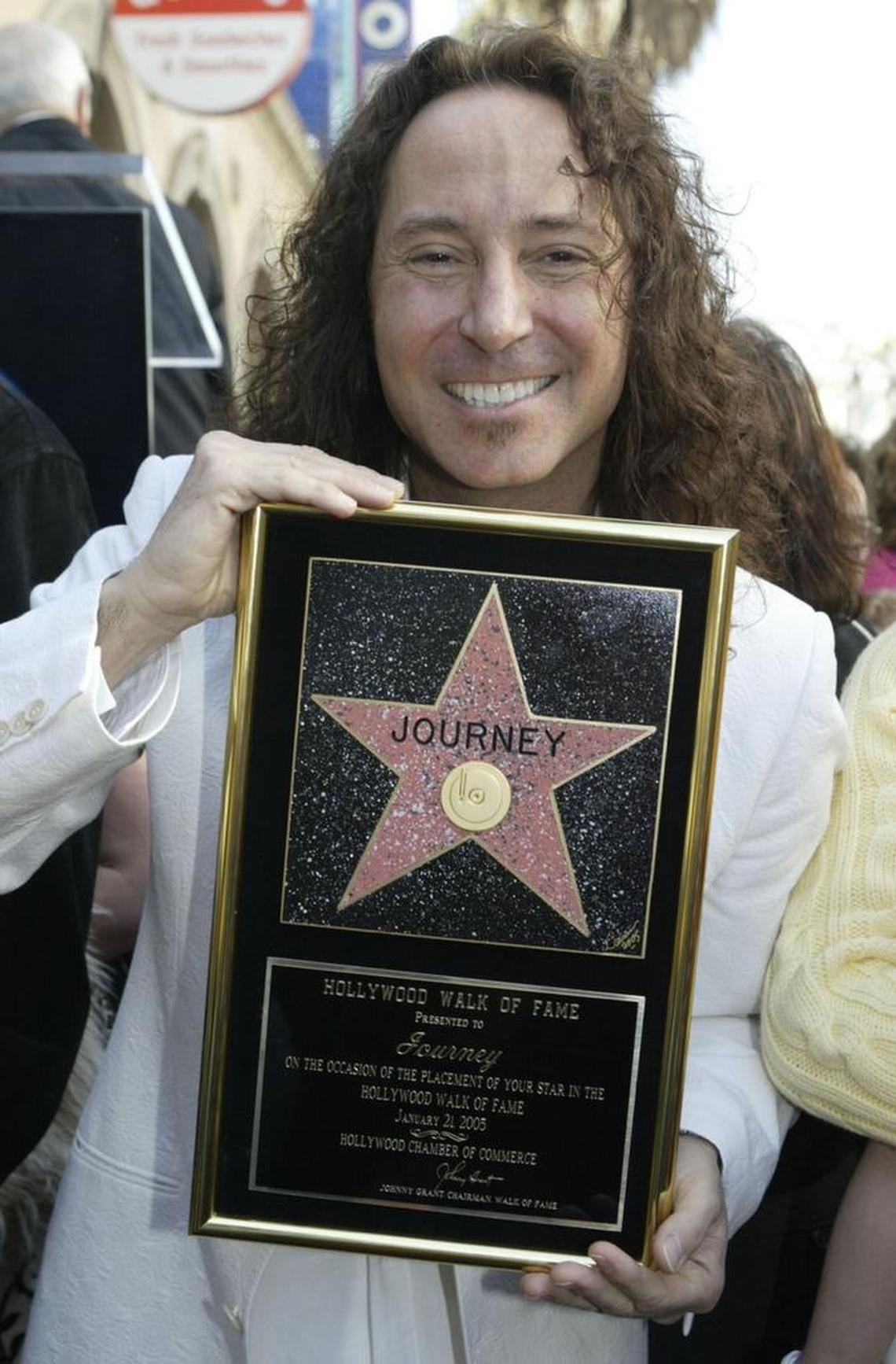 Former Journey lead vocalist Steve Augeri celebrated Journey’s honor of a star on the Hollywood Walk of Fame in this Jan. 21, 2005 file photo in Los Angeles. Augeri is now performing tunes from the band as a member of The Rock Pack tour coming to Hard Rock Live.