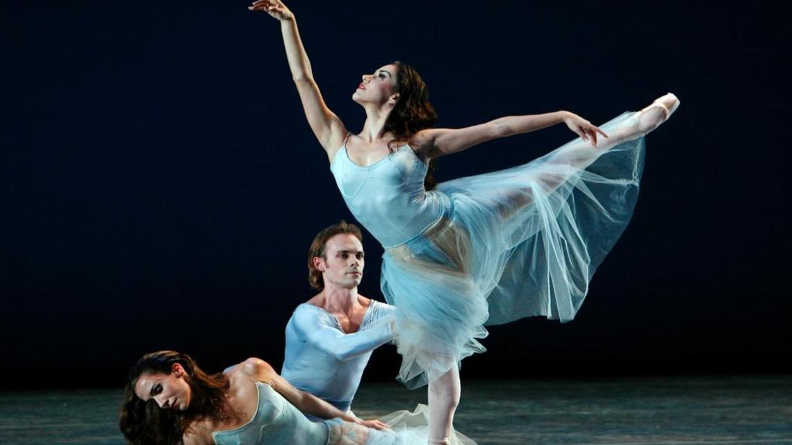 Patricia Delgado (arabesque) performing George Balanchine’s “Serenade” with Deanna Seay and Didier Bramaz at the Broward Center for the Performing Arts in 2008.