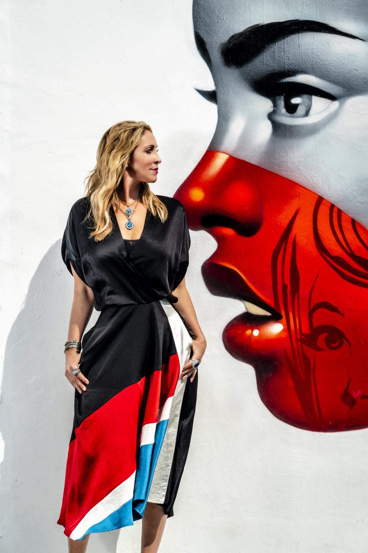 Dress by Zero + Maria Cornejo from Barneys New York, jewelry by Sevan Biçakçi at Miami Design District. Artwork: Tristan  Eaton. Photograph by Nick Garcia. Styling by Elysze Held.