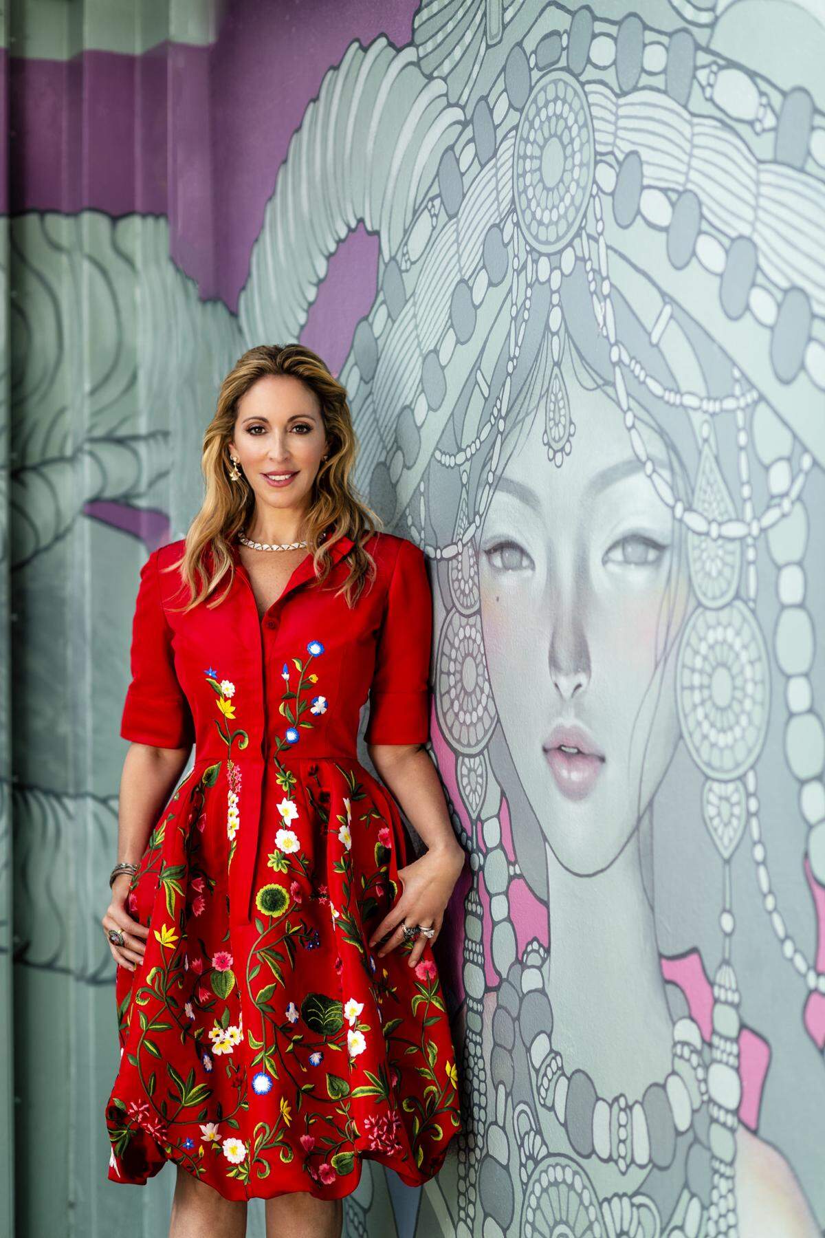 Dress by Oscar de la Renta from Neiman Marcus at Merrick Park, “Diva’s Dream” necklace and earrings by Bulgari at Miami Design District. Artwork: Audrey Kawasaki.  Photograph by Nick Garcia. Styling by Elysze Held.