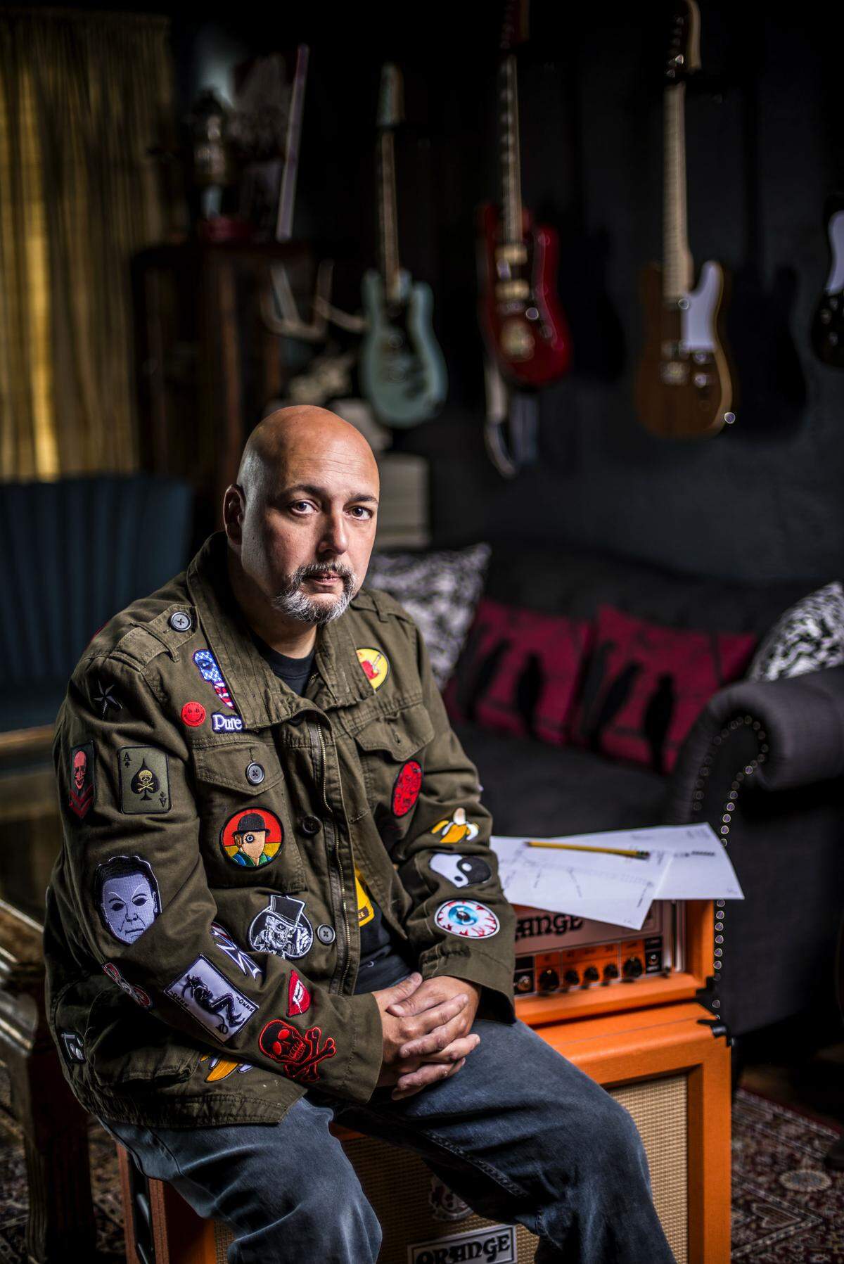 Richard Sell, a retired Miami-Dade police officer, runs PureSalem Guitars in Miami. Photograph by Felipe Cuevas.