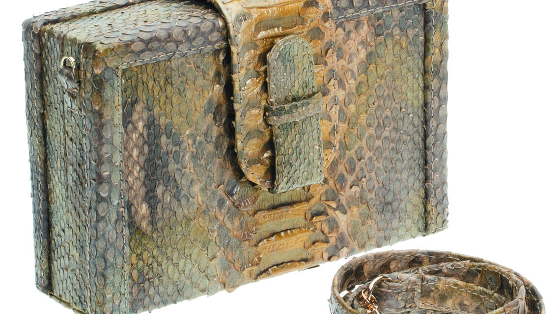 Miami designer’s python handbags slither up to Bergdorf Goodman