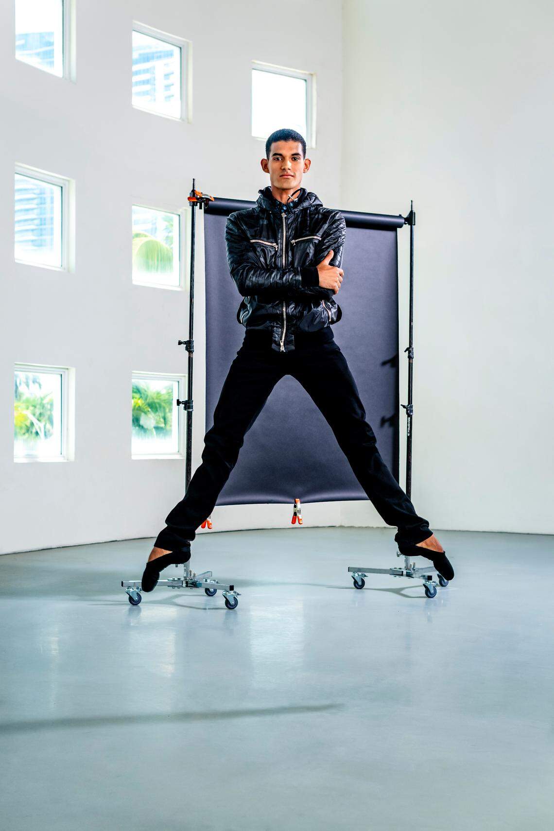 On Renan: Jacket by Balmain, jeans by Hudson Jeans from Saks Fifth Avenue at Bal Harbour Shops; shirt by Jared Lang Collection at Aventura Mall. Photograph by Nick Garcia.